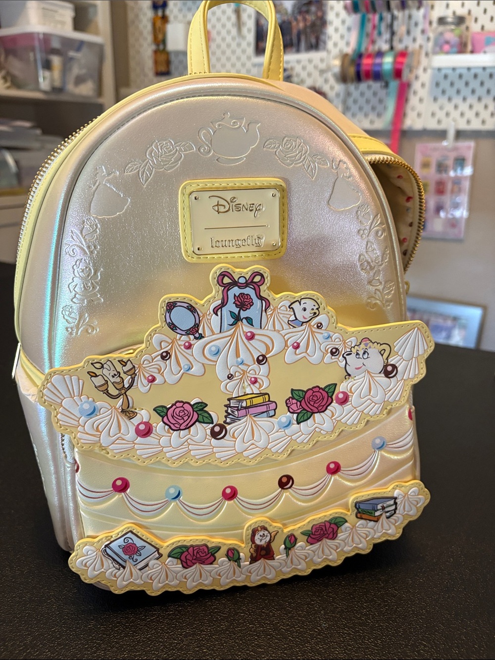 NWT Loungefly Iridescent Pearl and Yellow Disney Belle Dessert Mini Backpack